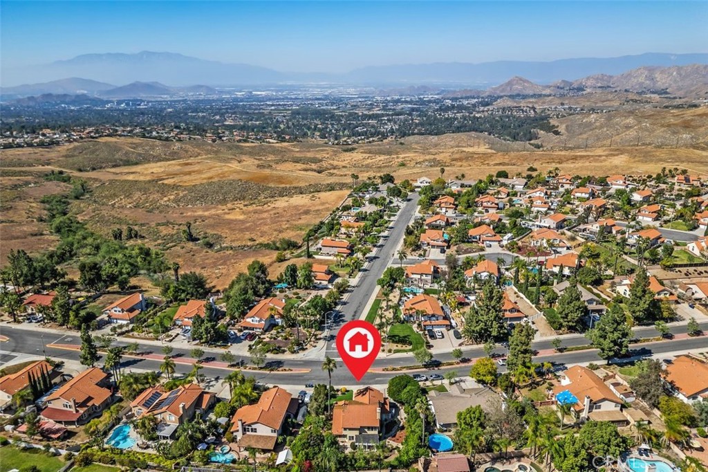 305 Mission Grove Parkway North Riverside, CA 92506 - Photo 6 of 49 an aerial view of residential building and lake