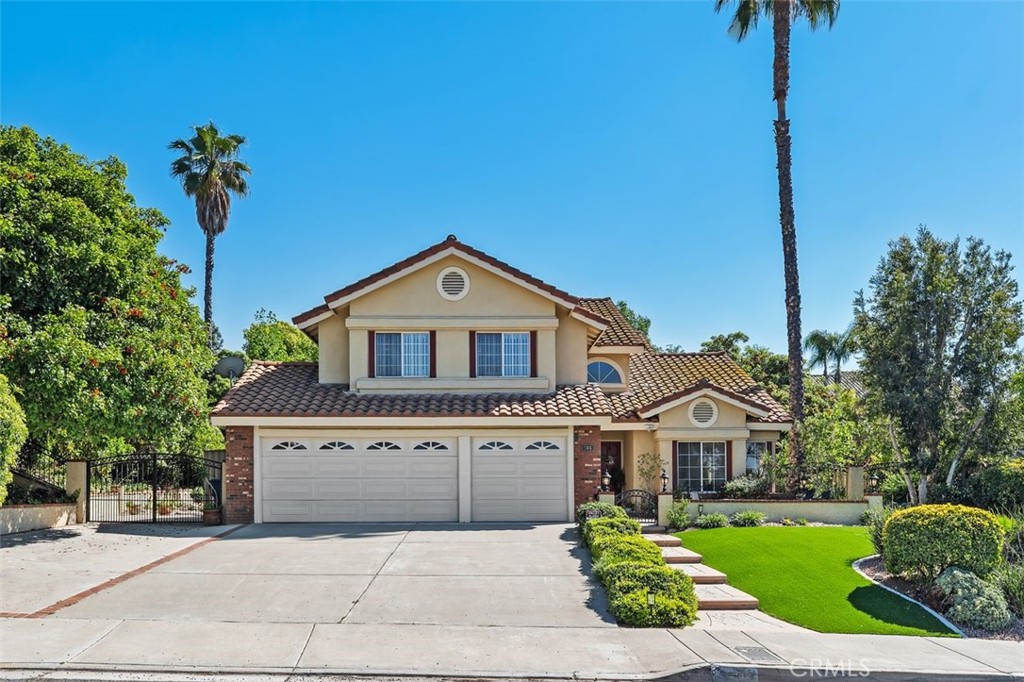 305 Mission Grove Parkway North Riverside, CA 92506 - Photo 10 of 49 a front view of a house with a yard