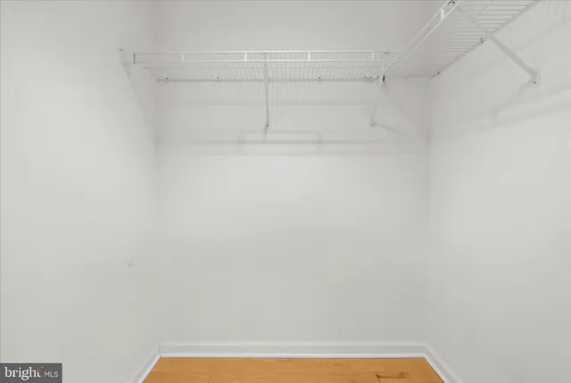 a bathroom with a tub and shower