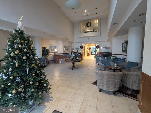 a view of a livingroom with furniture window and outside view