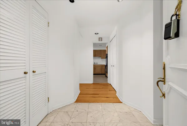 a kitchen with sink cabinets and microwave
