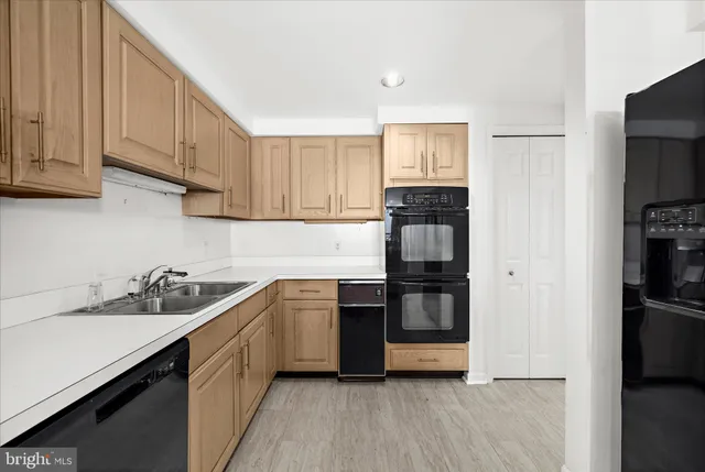 a large bathroom with a double vanity sink and a mirror