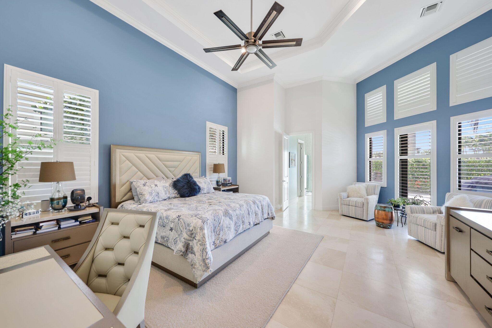 2530 Northwest 71st Street Boca Raton, FL 33496 - Photo 24 of 94 a bedroom with a bed and a large window