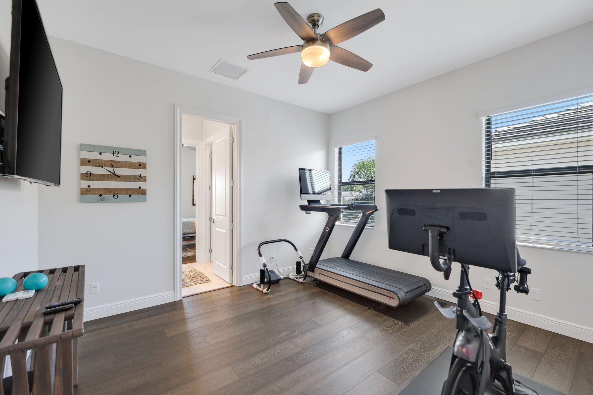 2530 Northwest 71st Street Boca Raton, FL 33496 - Photo 52 of 94 a view of a room with gym equipment