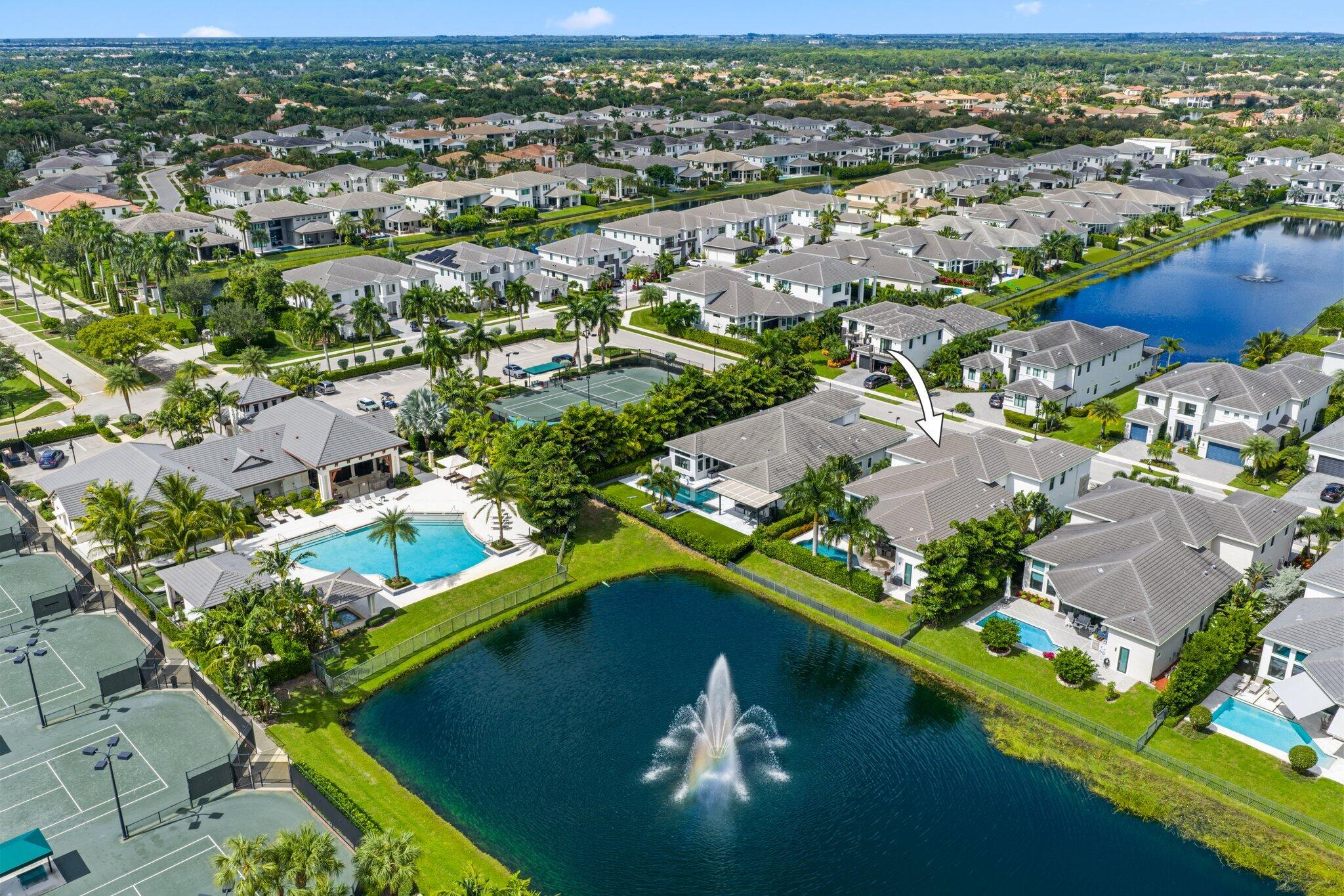 2530 Northwest 71st Street Boca Raton, FL 33496 - Photo 67 of 94 an aerial view of residential houses with outdoor space