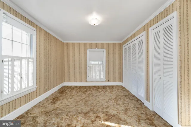 a view of an empty room with window