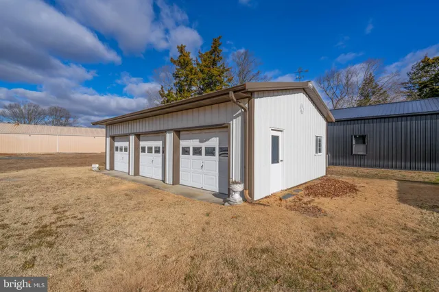 an aerial view of houses with outdoor space
