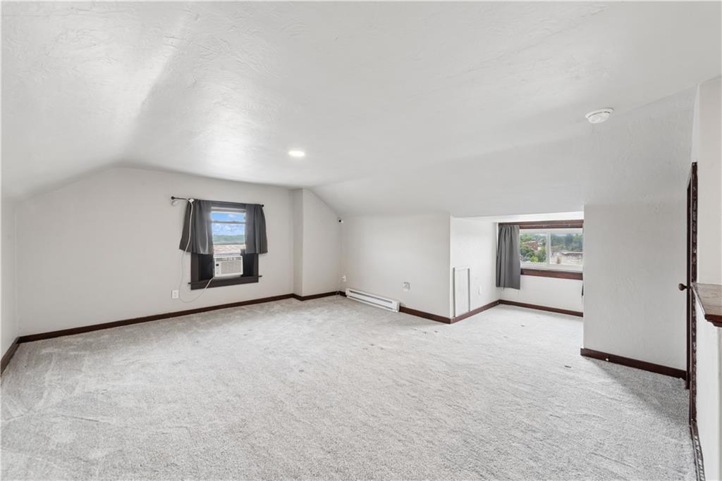 53 Calhoun Avenue Pittsburgh, PA 15210 - Photo 18 of 30 an empty room with windows and closet