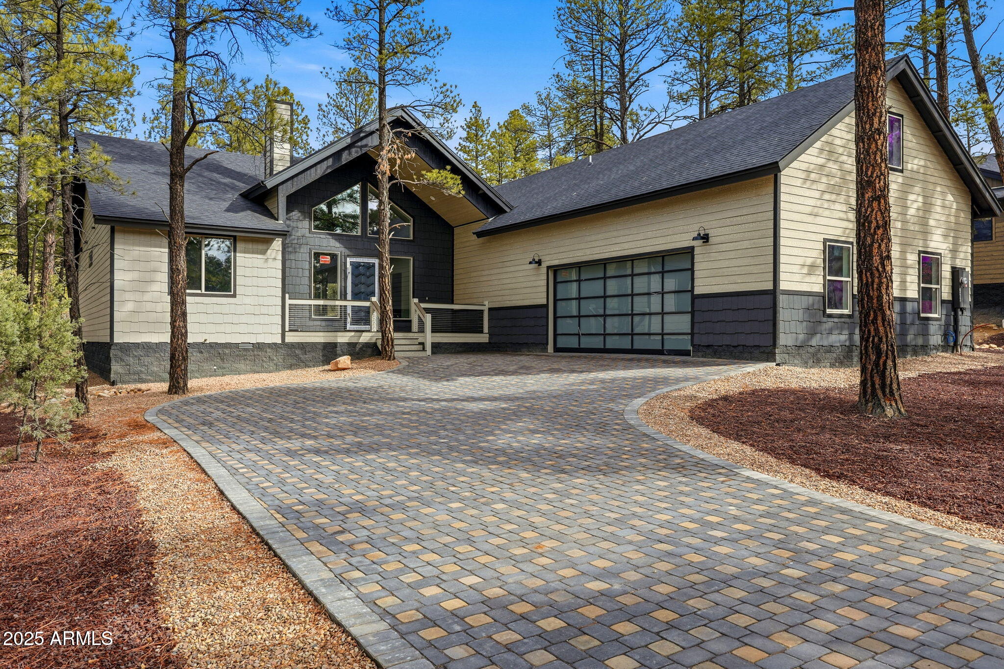 a front view of a house with a garage