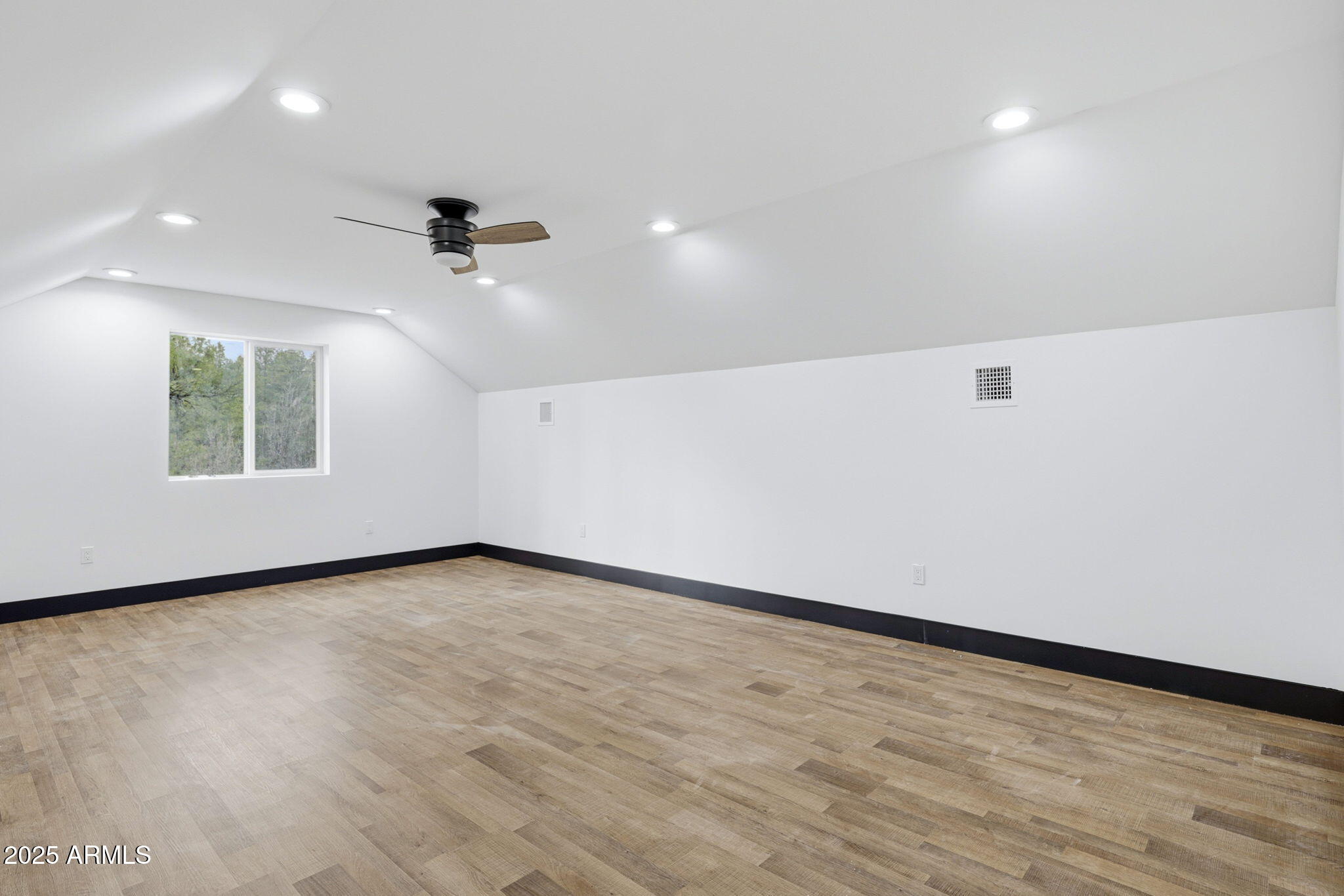 2400 West Bench Road Show Low, AZ 85901 - Photo 24 of 37 an empty room with a empty space and windows