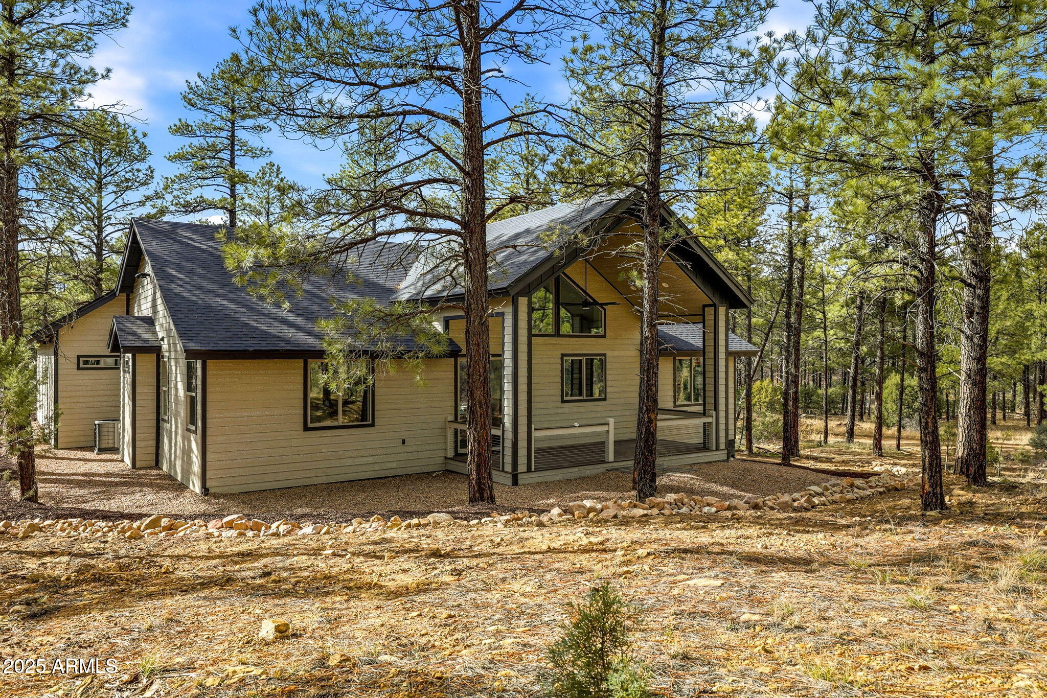 2400 West Bench Road Show Low, AZ 85901 - Photo 29 of 37 a house with trees in front of it