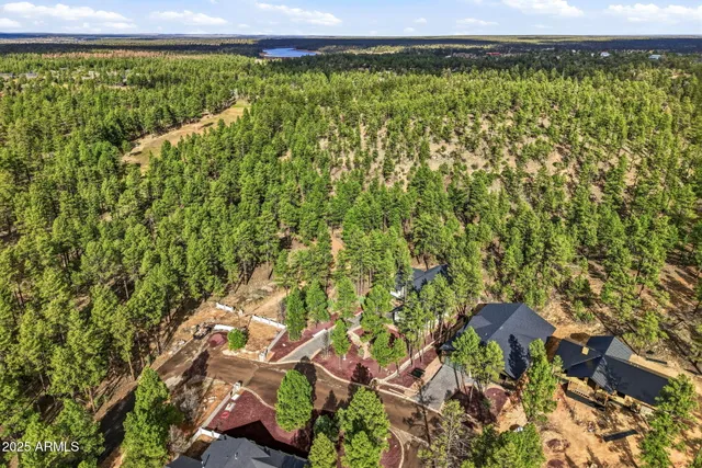 a view of a yard with an outdoor seating