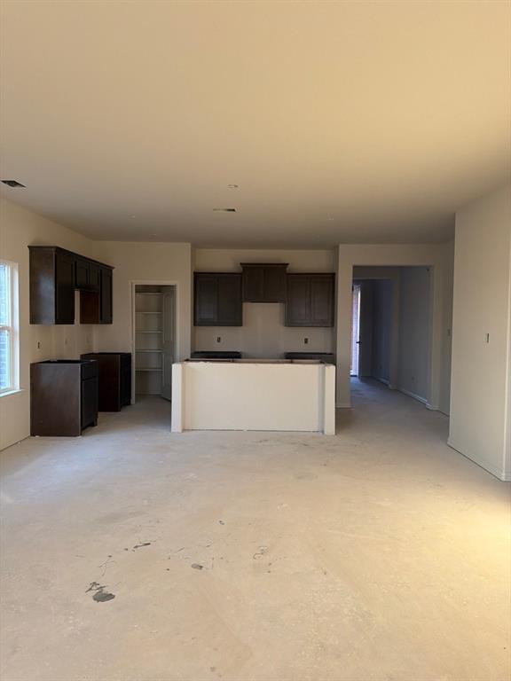3504 Helena Street Gainesville, TX 76240 - Photo 4 of 7 a view of kitchen with furniture and a flat screen tv