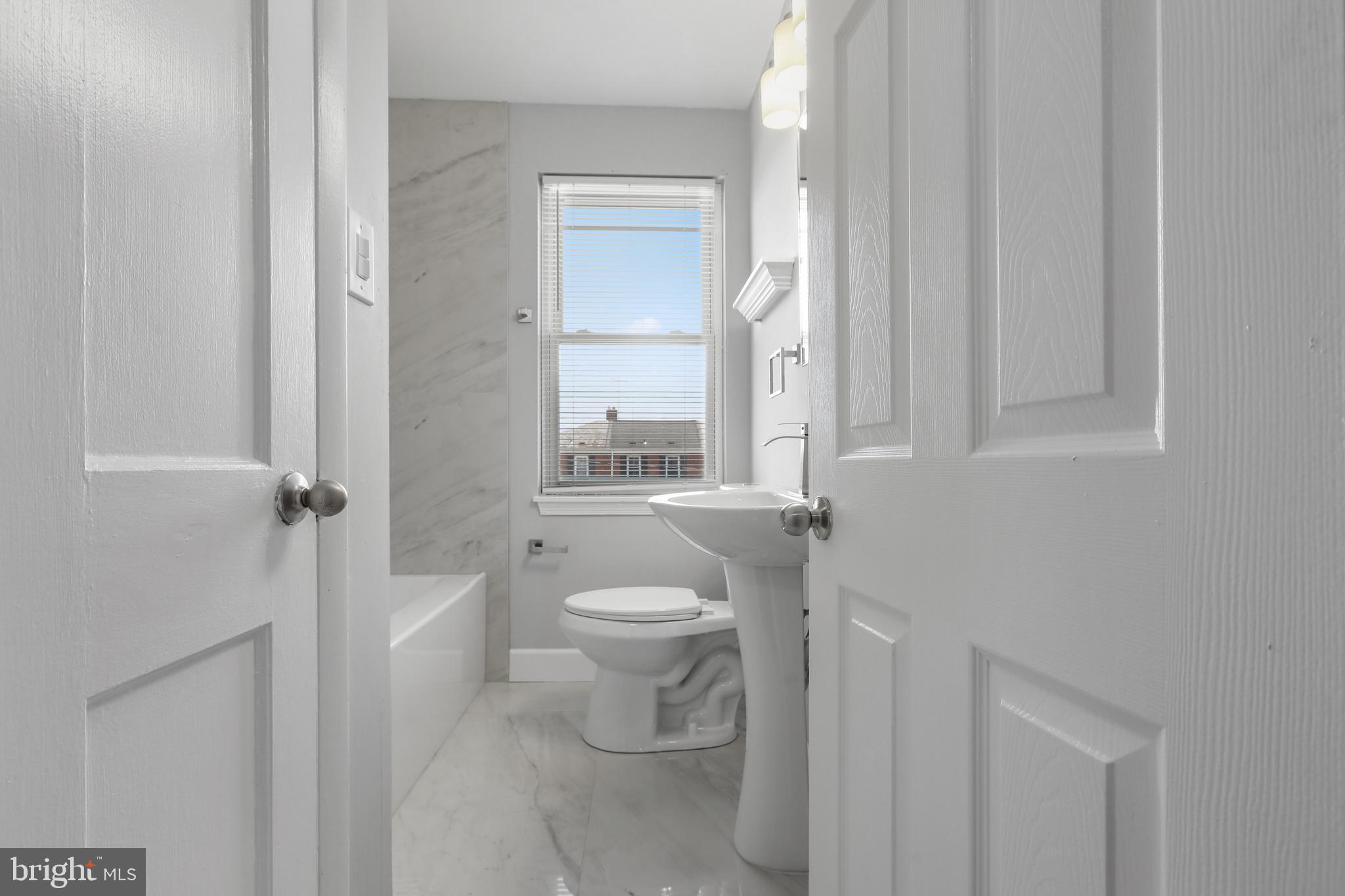 1714 Pin Oak Road Parkville, MD 21234 - Photo 25 of 41 Fully renovated bath with linen closet & blinds