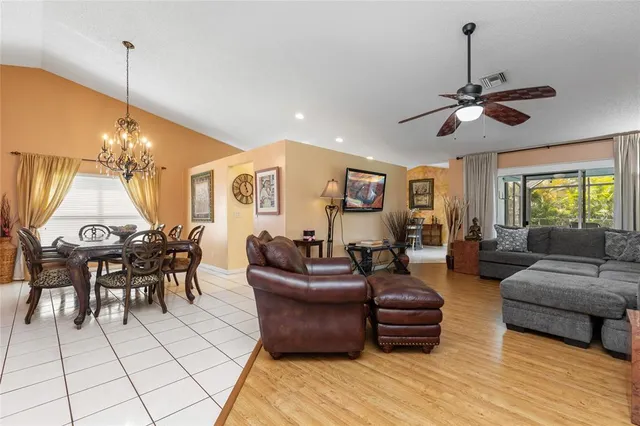a kitchen with white cabinets stainless steel appliances and sink