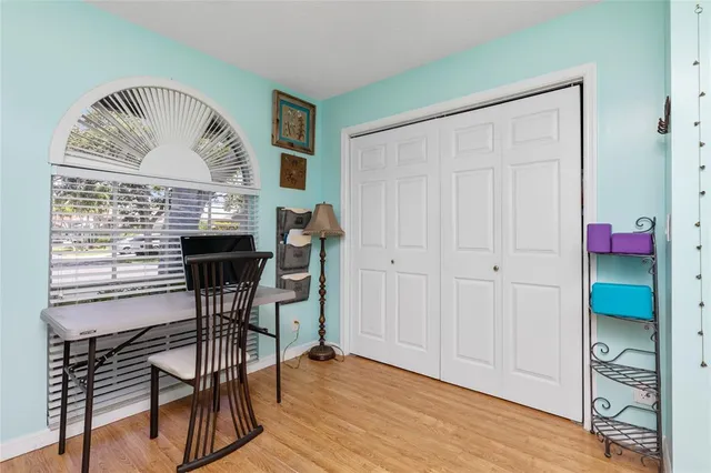 a bathroom with a sink a vanity and a mirror
