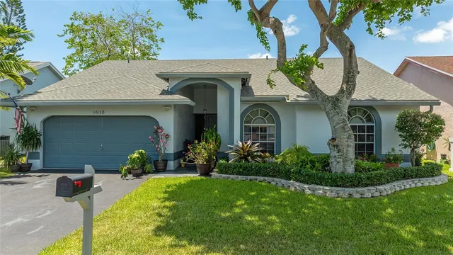 a view of a two chairs in a yard