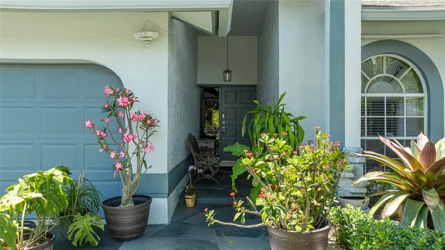 an aerial view of a house with swimming pool