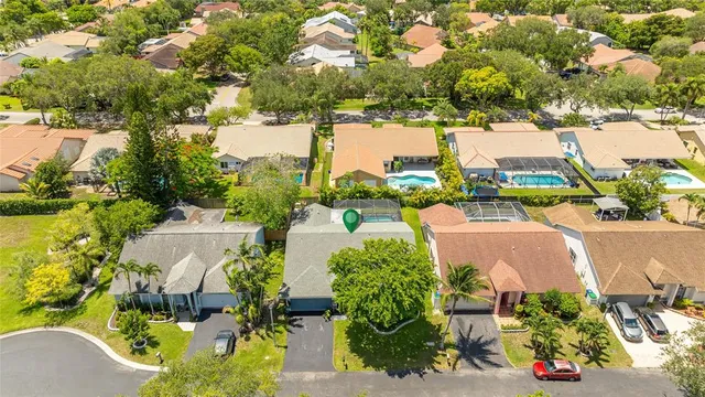 $665,000 | 9910 Northwest 53rd Court, Coral Springs, FL 33076