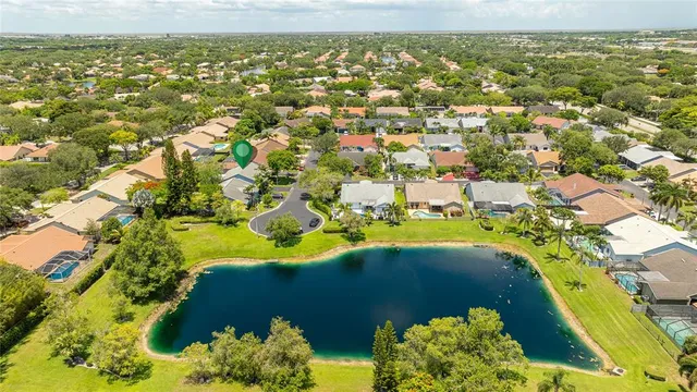 $665,000 | 9910 Northwest 53rd Court, Coral Springs, FL 33076