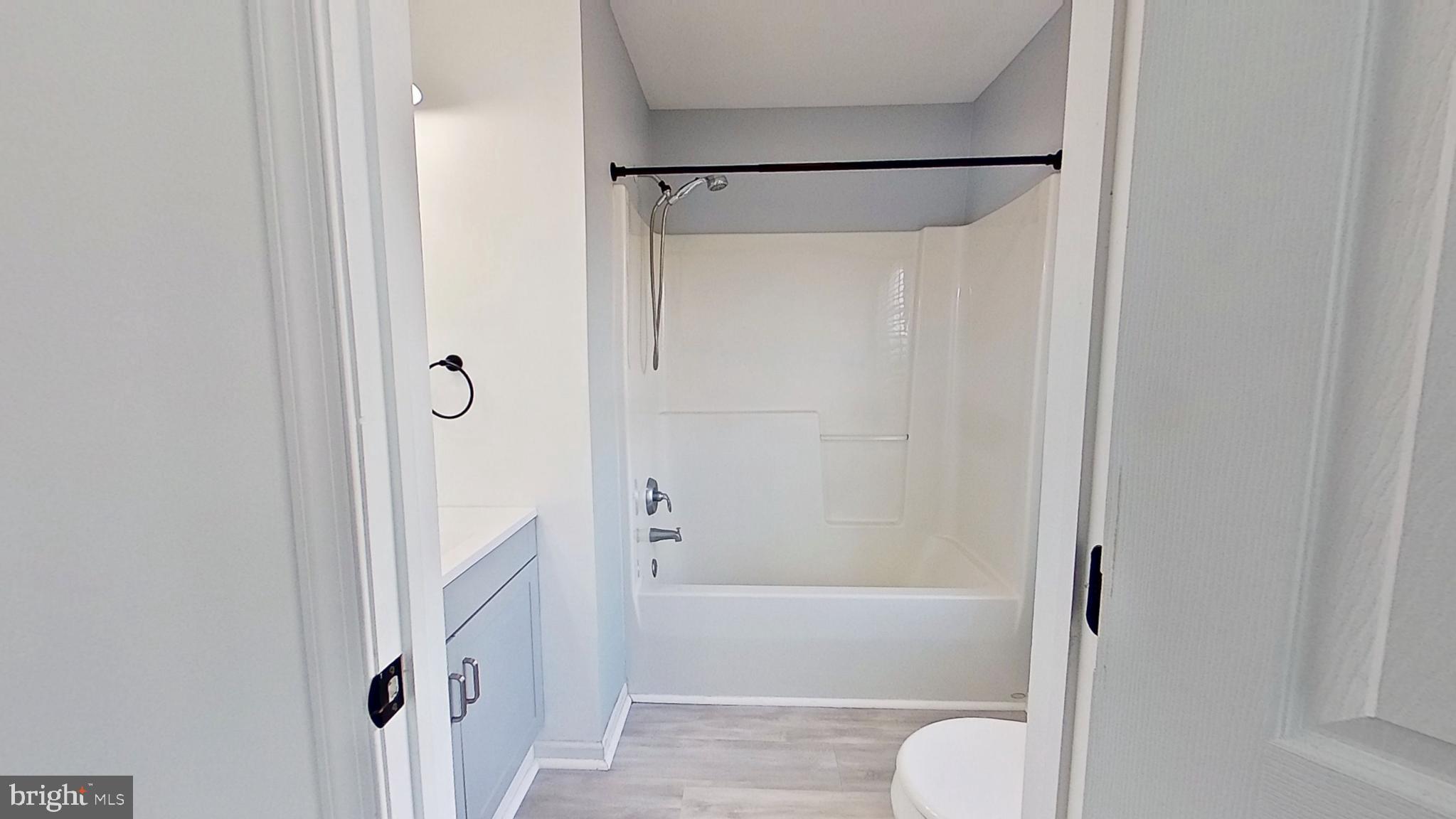 450 Fisher Drive York, PA 17404 - Photo 7 of 12 a bathroom with a shower and toilet