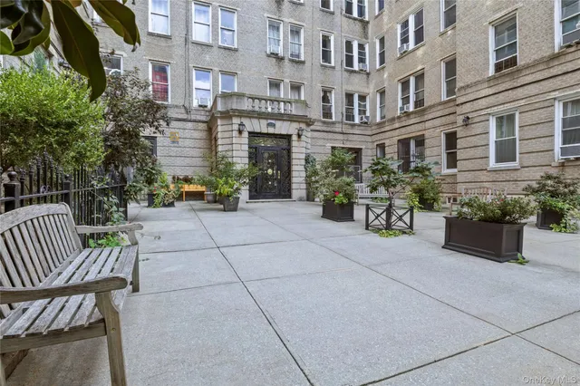 a view of a building with a bench