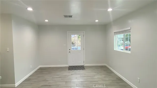 an empty room with windows