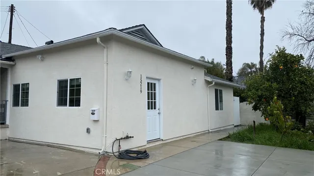 a front view of a house with garage