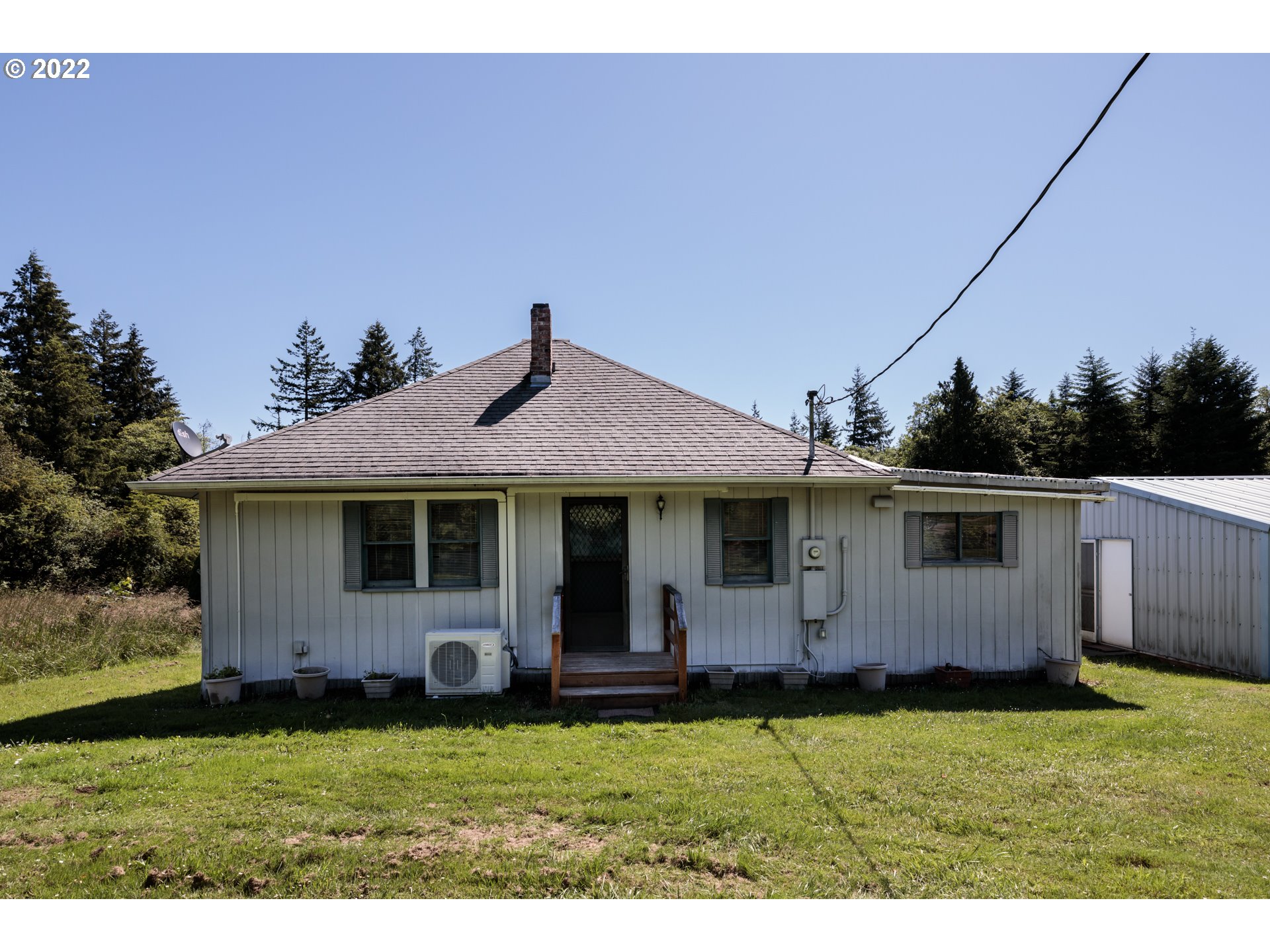 67954 Andy Thomas Road Rainier, OR 97048 - Photo 2 of 14 a view of a house with backyard