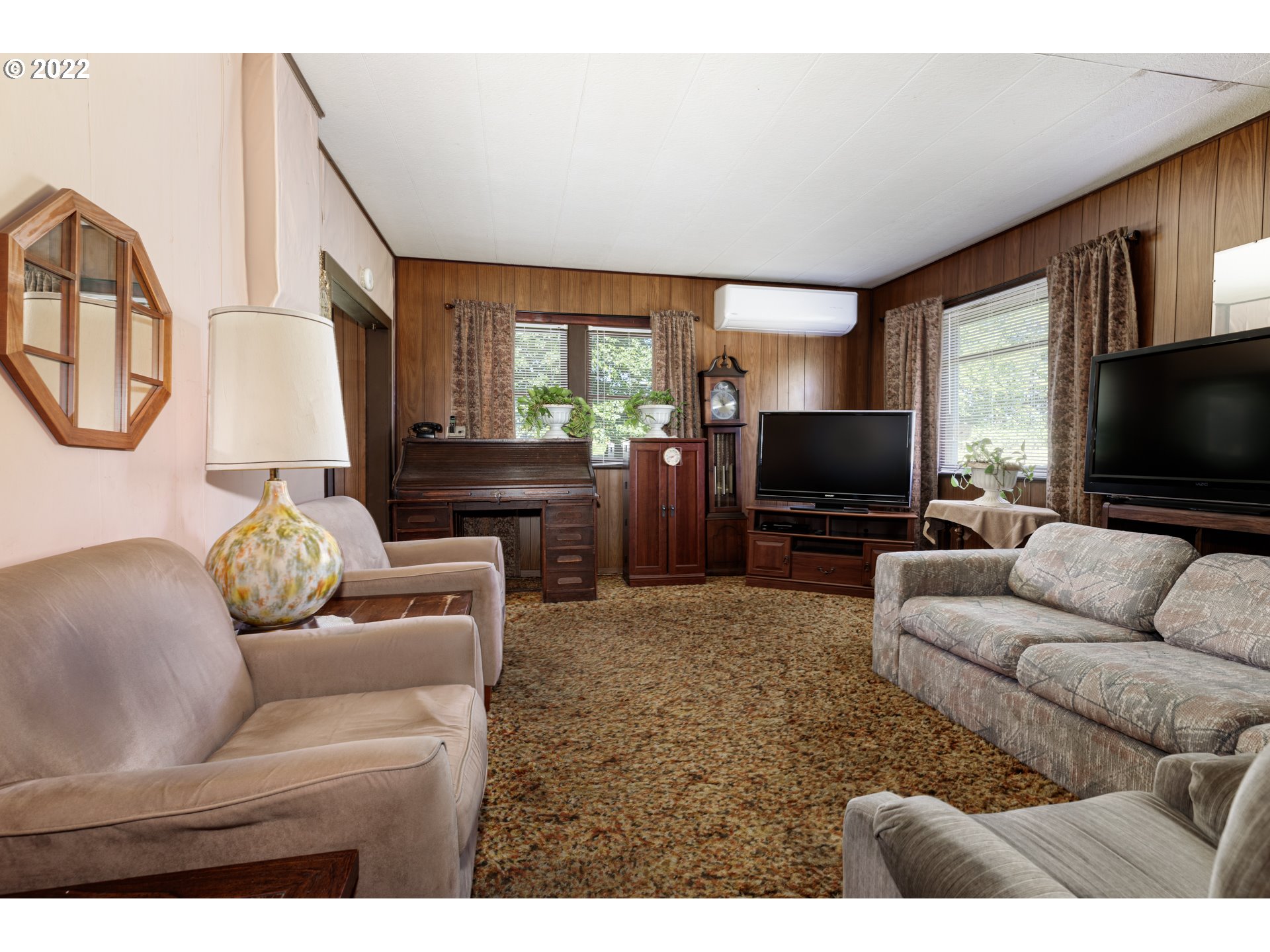 67954 Andy Thomas Road Rainier, OR 97048 - Photo 4 of 14 a living room with furniture and a flat screen tv