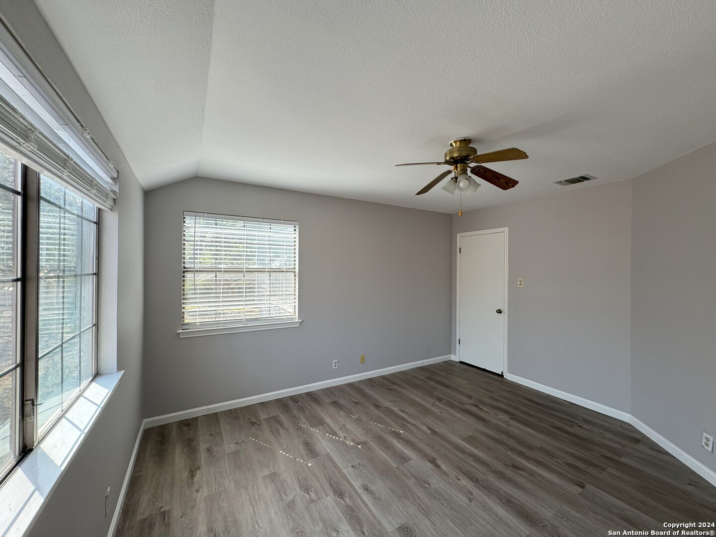 5939 Heather View San Antonio, TX 78249 - Photo 14 of 31 a view of room with a ceiling fan and window