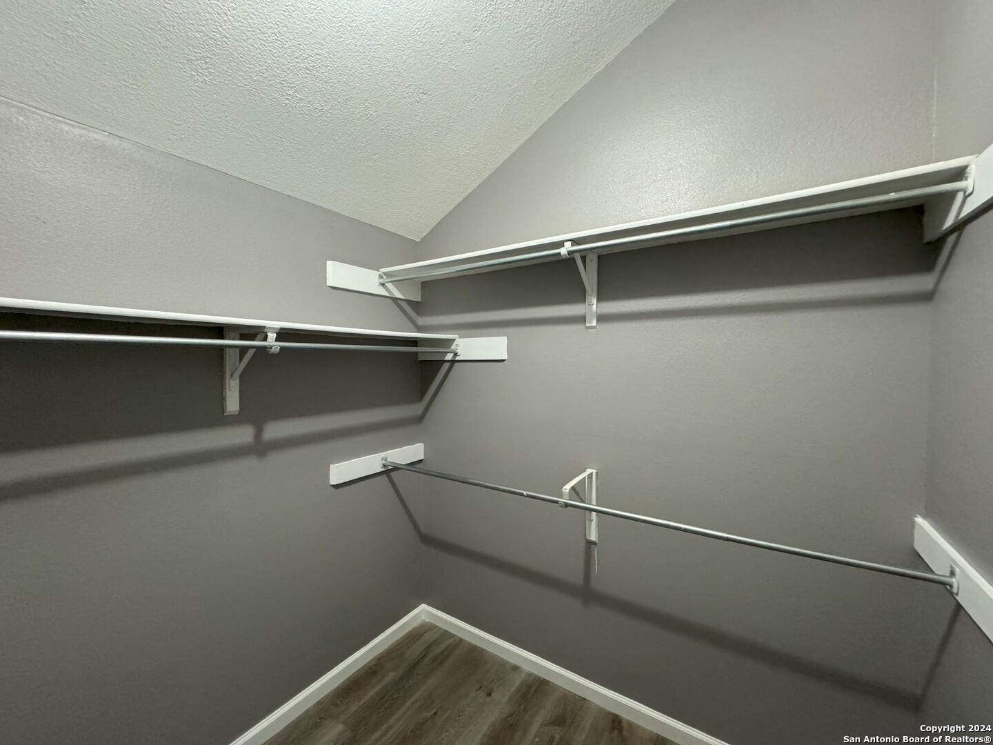 5939 Heather View San Antonio, TX 78249 - Photo 25 of 31 a view of a room with racks on the wall