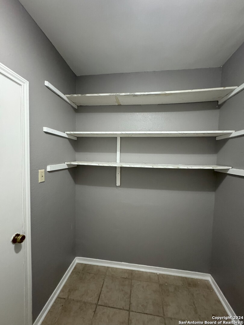 5939 Heather View San Antonio, TX 78249 - Photo 31 of 31 a view of a room with shelf