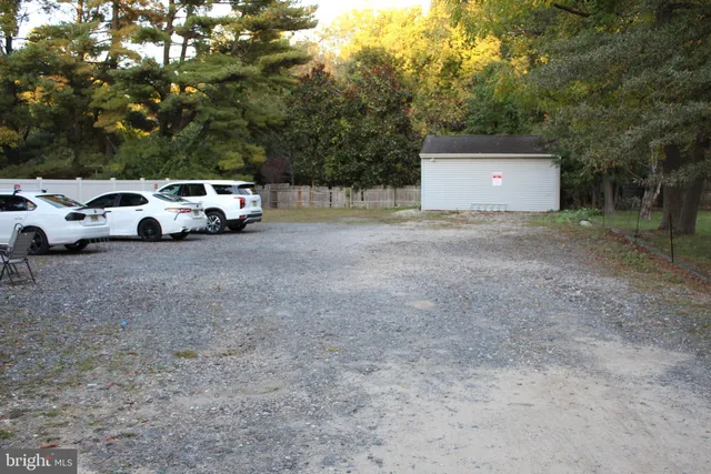 a view of outdoor space with deck and yard