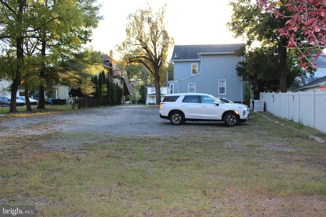 a car parked in front of a house