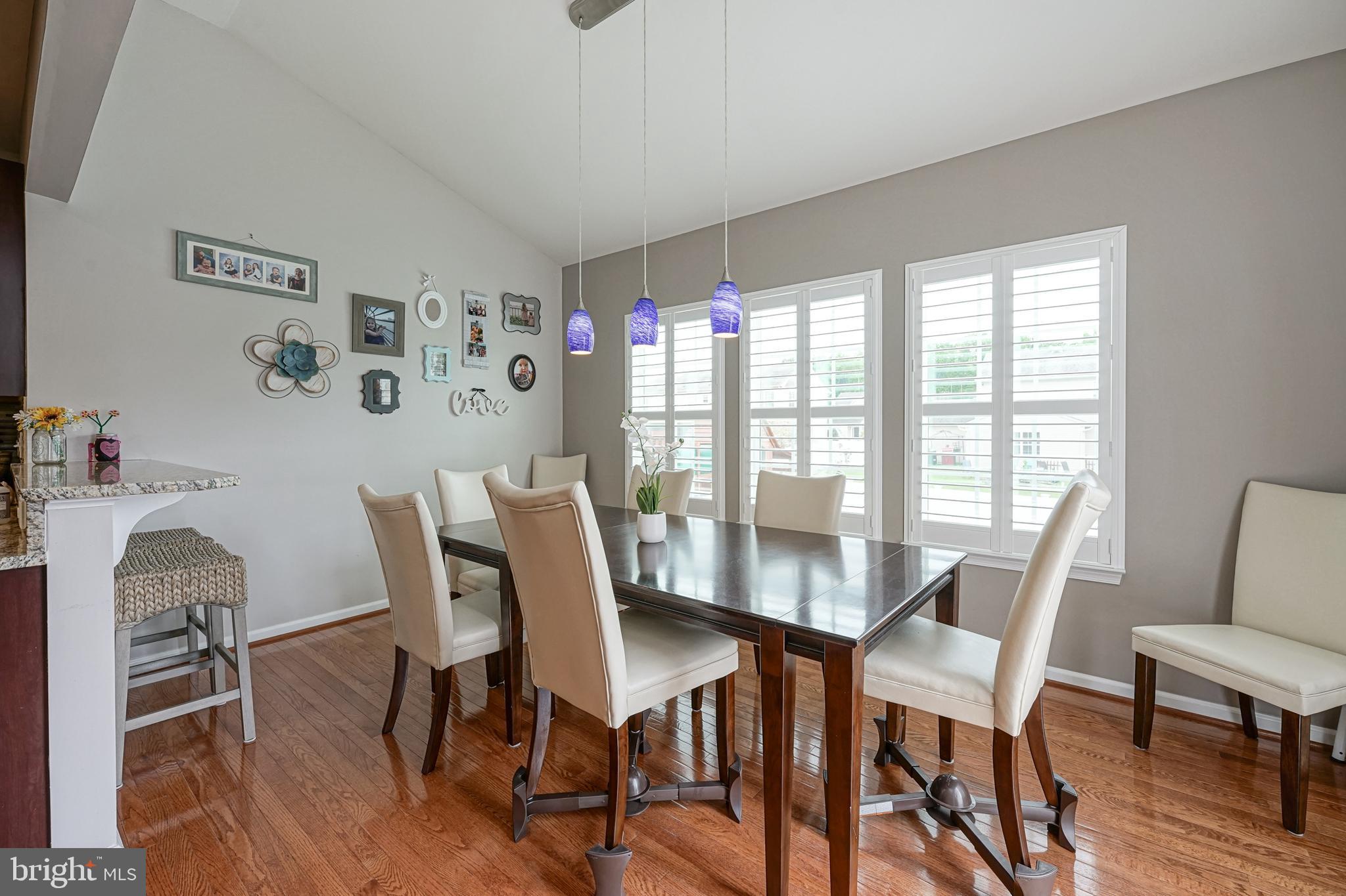259 Staggerbush Road Williamstown, NJ 08094 - Photo 8 of 38 Morning Room w/ Breakfast Bar & Stool Seating