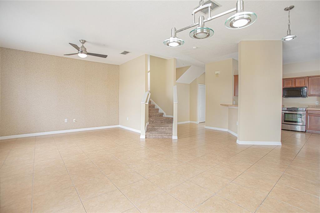 6468 South Goldenrod Road, Unit 34B Orlando, FL 32822 - Photo 14 of 34 a view of an empty room with a window