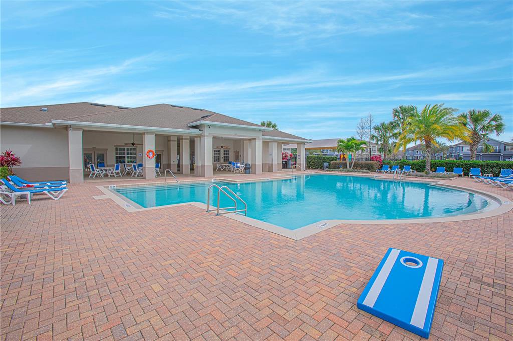 6468 South Goldenrod Road, Unit 34B Orlando, FL 32822 - Photo 26 of 34 a view of a house with a swimming pool