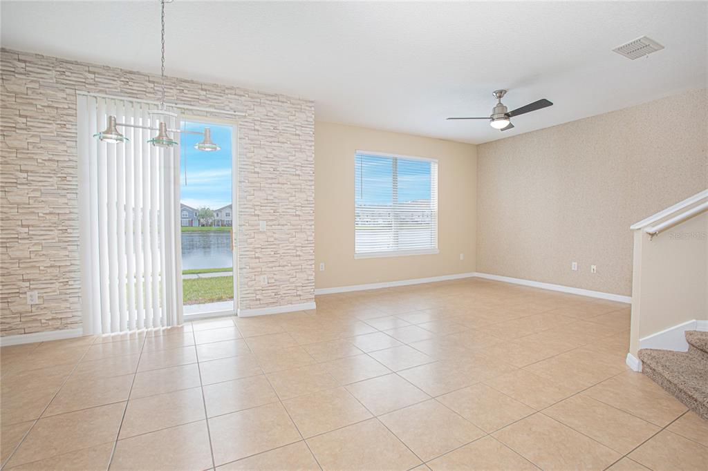 6468 South Goldenrod Road, Unit 34B Orlando, FL 32822 - Photo 6 of 34 a view of an empty room with a window