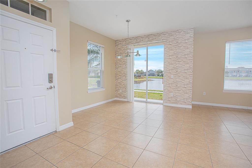 6468 South Goldenrod Road, Unit 34B Orlando, FL 32822 - Photo 8 of 34 a view of an empty room with a window