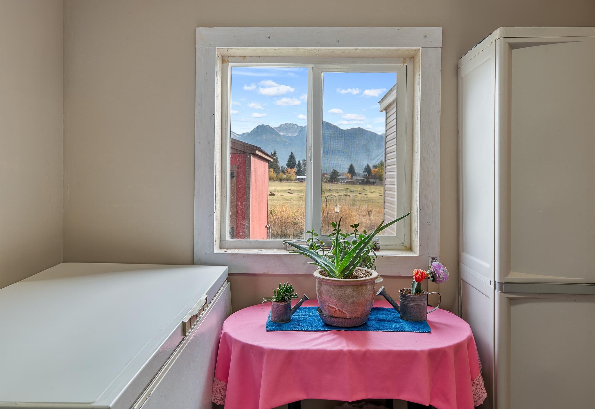 1040 Round Butte Road, Unit 34 Ronan, MT 59864 - Photo 24 of 30 Dining room with a mountain view