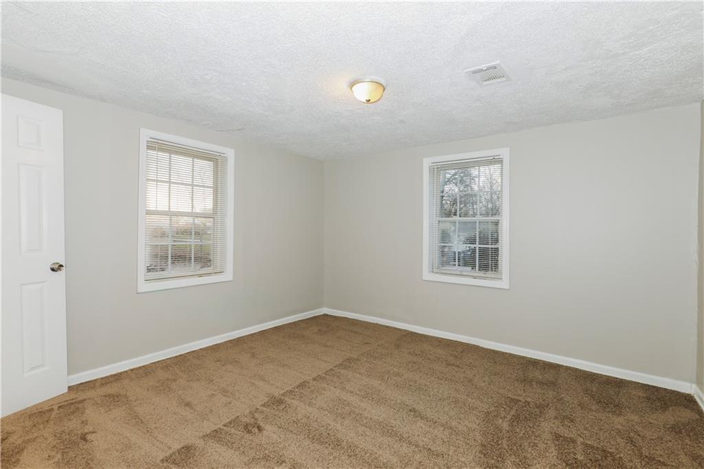 335 Mount Zion Road Southwest Atlanta, GA 30354 - Photo 5 of 11 a view of a livingroom with a window
