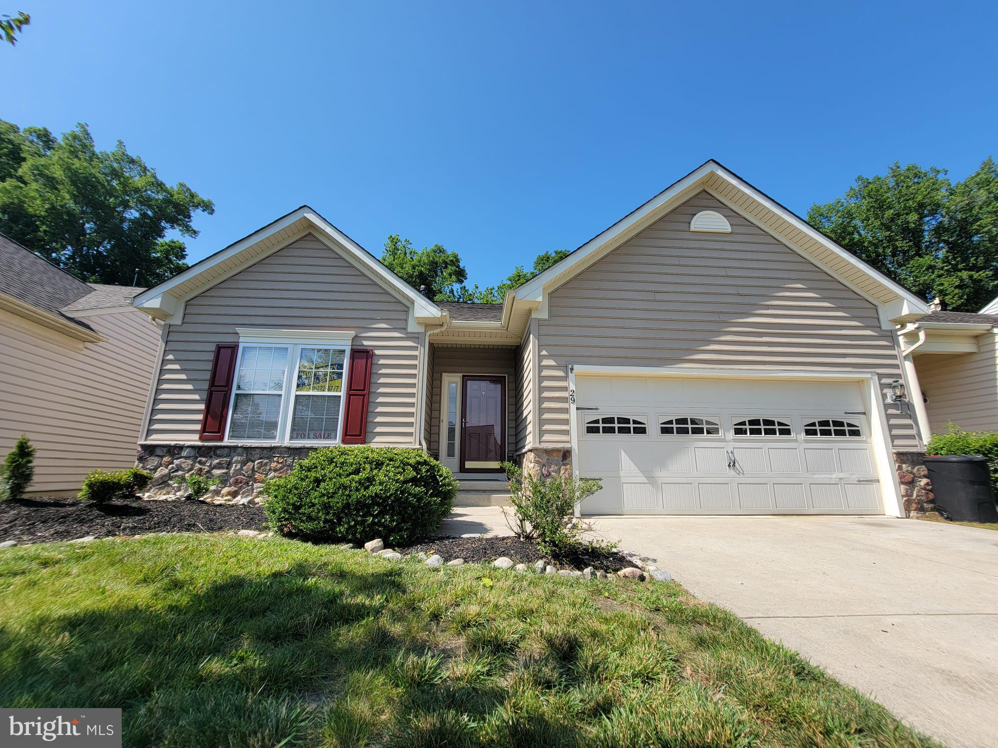 29 Hearthstone Boulevard Pemberton, NJ 08068 - Photo 13 of 17 a front view of a house with a yard