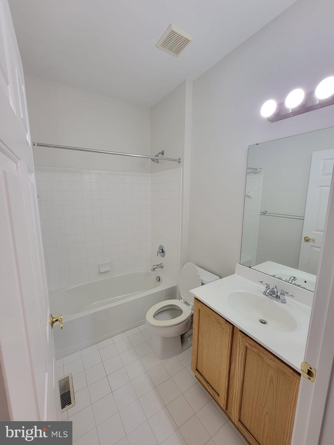29 Hearthstone Boulevard Pemberton, NJ 08068 - Photo 3 of 17 a bathroom with a sink a toilet and shower