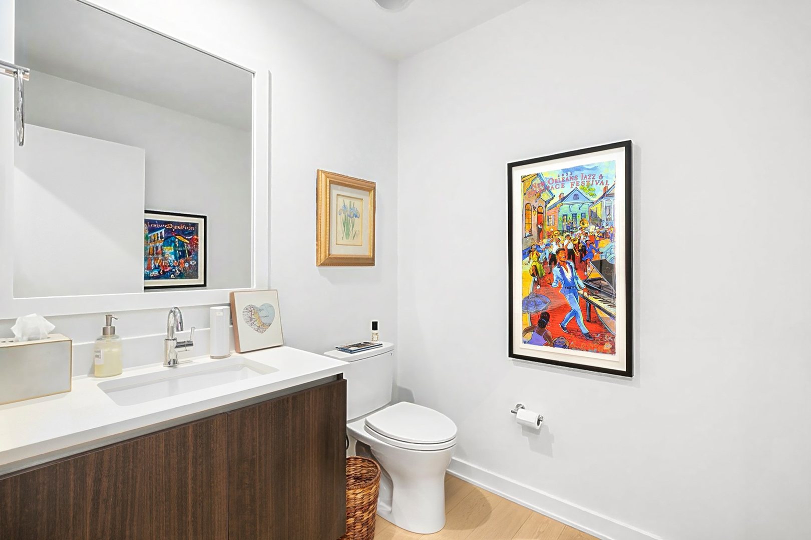 1648 West Division Street, Unit 703 Chicago, IL 60622 - Photo 12 of 41 a bathroom with a toilet a sink and mirror