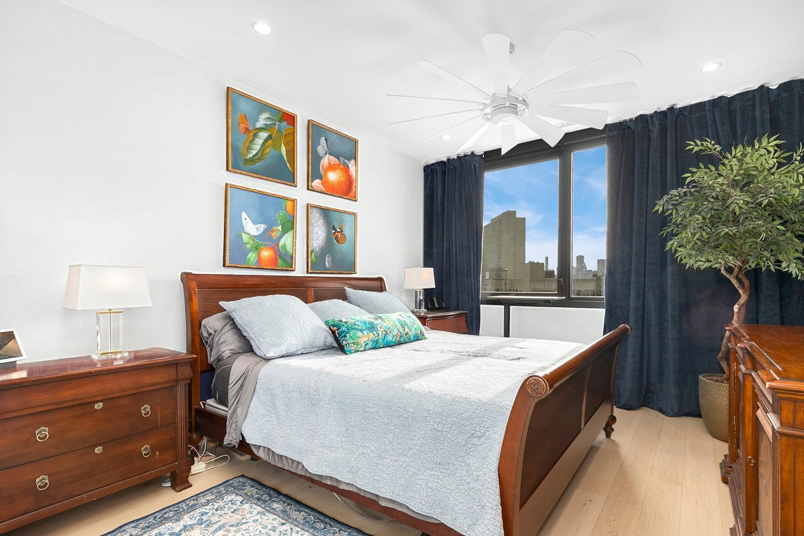 1648 West Division Street, Unit 703 Chicago, IL 60622 - Photo 14 of 41 a bedroom with a bed and a chandelier