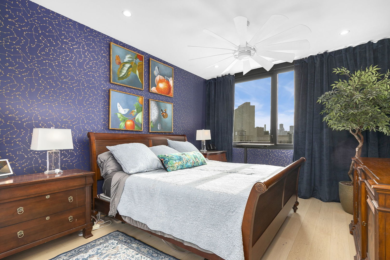1648 West Division Street, Unit 703 Chicago, IL 60622 - Photo 15 of 41 a bedroom with a bed and a chandelier