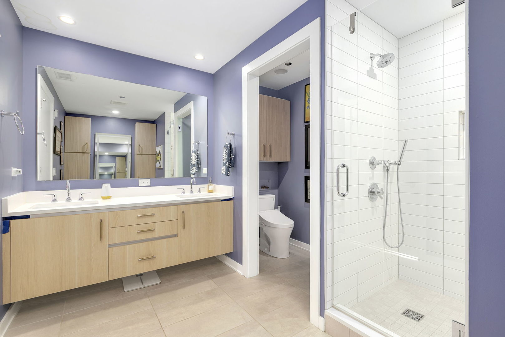 1648 West Division Street, Unit 703 Chicago, IL 60622 - Photo 17 of 41 a bathroom with a granite countertop sink a toilet and shower