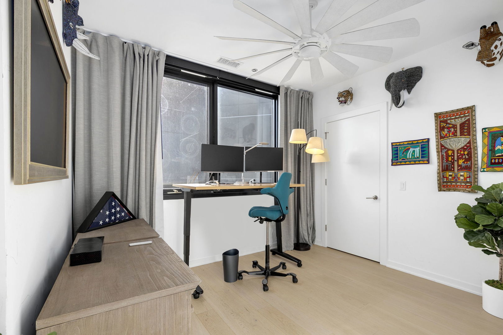 1648 West Division Street, Unit 703 Chicago, IL 60622 - Photo 22 of 41 a view of a workspace with furniture and a window