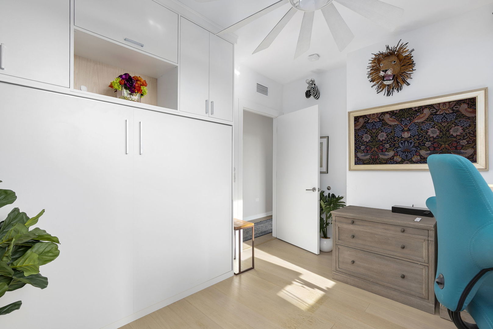 1648 West Division Street, Unit 703 Chicago, IL 60622 - Photo 23 of 41 a view of a hallway with wooden floor and furniture